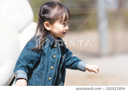 Girls playing in the park Girls playing in the park 102021804