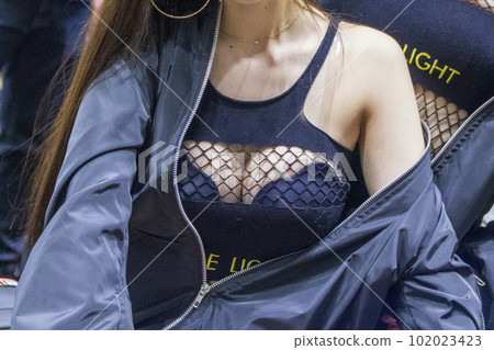 Reticulated busty cleavage of a beautiful female model with good style 102023423