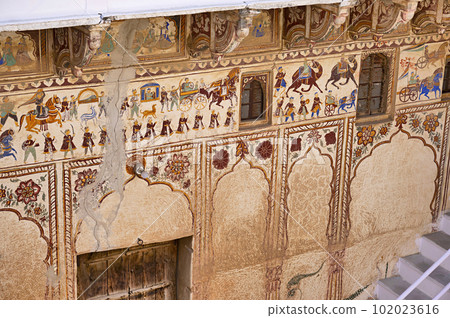 Colourful mythological paintings on the inner wall of an old chhatri (cenotaph), Seth Anantram Podar and family ki smarak rupi chhatri, located in Ramgarh, Shekhawati, Rajasthan, India 102023616