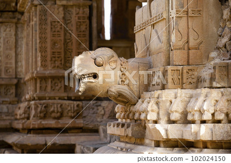Gargoyle carved in sandstone, on the outer wall of Gopinath Mandir, situated in the Bhangarh Fort complex, is a 16th-century fort built in 1573, Alwar district, Rajasthan, India Gargoyle carved in sandstone, on the outer wall of Gopinath Mandir, situated in the Bhangarh Fort complex, is a 16th-century fort built in 1573, Alwar district, Rajasthan, India 102024150