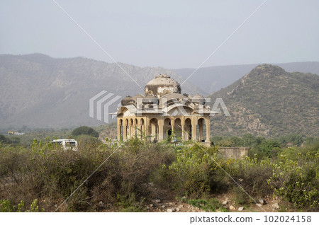 Ruins of an old tomb near the Bhangarh Fort, is a 16th-century fort built in 1573, Alwar district, Rajasthan, India 102024158
