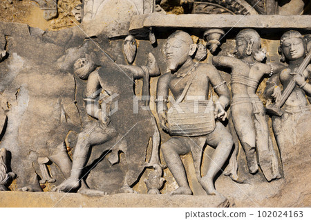 Carved idols on the pillar of Harshnath Temple, an ancient Hindu temple dedicated to Lord Shiva, situated on the top of a hill at Harsh Ki Pahadi, dated 973 CE, Sikar, Rajasthan, India 102024163