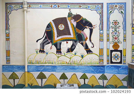 Freshly re-painted Haveli in Shekhawati, decorated with painted frescoes, located in Nawalgarh, Rajasthan, India Freshly re-painted Haveli in Shekhawati, decorated with painted frescoes, located in Nawalgarh, Rajasthan, India 102024193