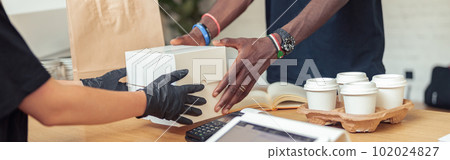 Man and woman holding for white box Man and woman holding for white box 102024827