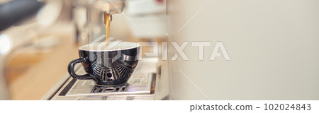 Latte with espresso machine steam in cafe Latte with espresso machine steam in cafe 102024843