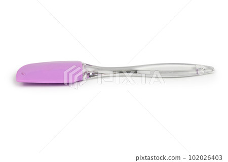 Pink rubber spatula, kitchen utensil. Isolated on white background. Side view. Pink rubber spatula, kitchen utensil. Isolated on white background. Side view. 102026403