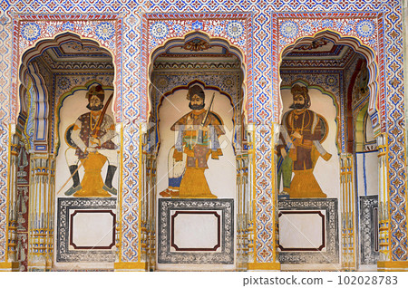 Colourful paintings on the inner wall of Dr. Ramnath Podar Haveli Museum, a cultural heritage museum which houses Rajasthani living style, miniature paintings, textiles, jewellery, and other items, Colourful paintings on the inner wall of Dr. Ramnath Podar Haveli Museum, a cultural heritage museum which houses Rajasthani living style, miniature paintings, textiles, jewellery, and other items, 102028783