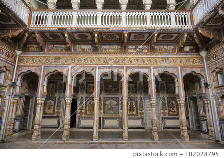 Colourful paintings on the inner wall of Dr. Ramnath Podar Haveli Museum, a cultural heritage museum which houses Rajasthani living style, miniature paintings, textiles, jewellery, and other items, Colourful paintings on the inner wall of Dr. Ramnath Podar Haveli Museum, a cultural heritage museum which houses Rajasthani living style, miniature paintings, textiles, jewellery, and other items, 102028795