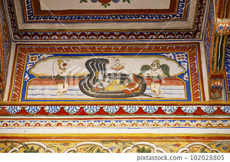 Colourful mythological painting on the inner wall of Dr. Ramnath Podar Haveli Museum, a cultural heritage museum which houses Rajasthani living style, miniature paintings, textiles, jewellery, and 102028805