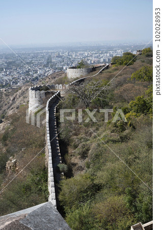 City of Jaipur and the fortification wall of Nahargarh Fort, Jaipur, Rajasthan, India 102028953