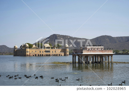 Jal Mahal or Water Palace is a palace in the middle of the Man Sagar Lake, built in the Rajput style of architecture on a grand scale, Jaipur, Rajasthan, India 102028965