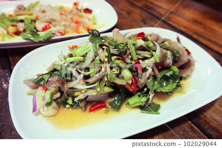 Spicy Thai fish salad, Thai cuisine Spicy Thai fish salad, Thai cuisine 102029044