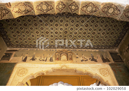 Colourful painting on the inner wall of Shri Gyan Gopalji Mandir, situated in the premises of Galtaji Mandir, Jaipur, Rajasthan, India 102029058