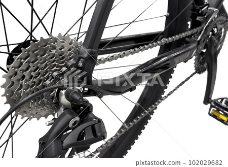 Part of mountain bicycle detail isolated on white background. Modern sport mountain bicycle bike exterior isolated.. Part of mountain bicycle detail isolated on white background. Modern sport mountain bicycle bike exterior isolated.. 102029682
