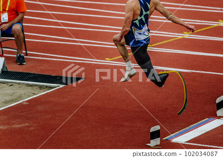 male para athlete on limb deficiency long jump take off board, summer para athletics championships 102034087