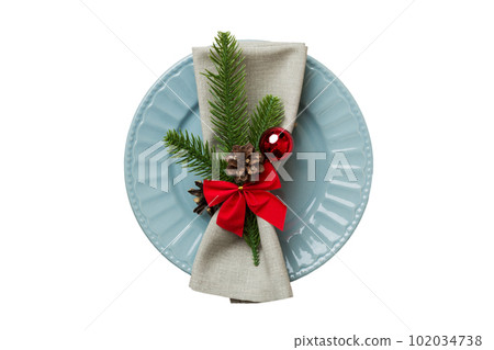isolated christmas Plate with decor and fork and spoon. New year holiday background. Top view 102034738