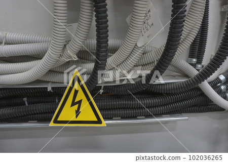 Be careful, the wiring is in a protective corrugation. Installation and wiring of electrical networks in an apartment or house. Be careful, the wiring is in a protective corrugation. Installation and wiring of electrical networks in an apartment or house. 102036265