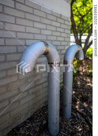 Underground structure manhole ventilation pipe in the shape of a candy cane. Underground structure manhole ventilation pipe in the shape of a candy cane. 102039991
