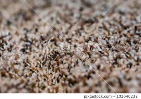 Compressed area of carpet with indentation where heavy furniture sat for a long period.  102040232