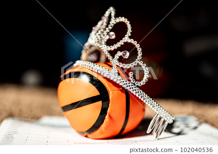 Basketball, tiara, and blank bracket signifying a Cinderella season. Basketball, tiara, and blank bracket signifying a Cinderella season. 102040536