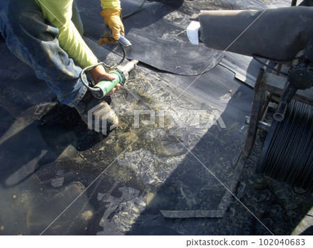 HDPE landfill liner patch being prepped for installation to repair a bad weld. HDPE landfill liner patch being prepped for installation to repair a bad weld. 102040683