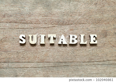 Alphabet letter block in word suitable on wood background Alphabet letter block in word suitable on wood background 102040861