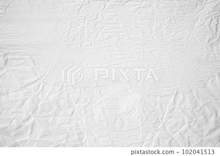 White crumpled with crease paper background texture 102041513