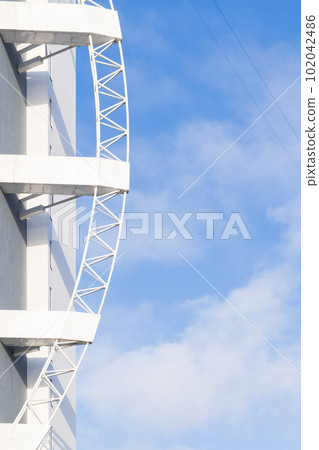Vertical photo with abstract modern architecture, white facade 102042486