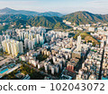 Aerial city view with crossroads and roads, houses, buildings and parking lots. Helicopter drone shot. Wide Panoramic image. - Image 102043072