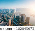 Aerial city view with crossroads and roads, houses, buildings and parking lots. Helicopter drone shot. Wide Panoramic image. - Image 102043073