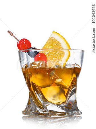 Old fashioned cocktail with cherries and blackberry with orange slice on white. Old fashioned cocktail with cherries and blackberry with orange slice on white. 102043638