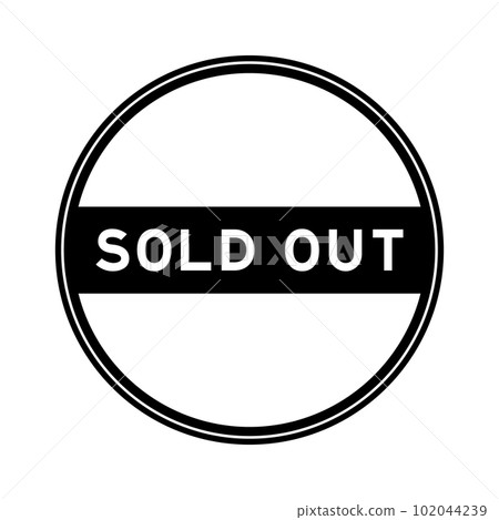 Black color round seal sticker in word sold out on white background 102044239