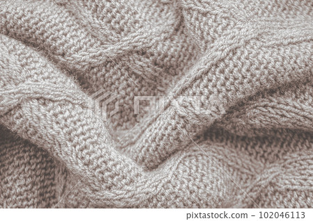 Handmade knitted background with macro weave threads. Handmade knitted background with macro weave threads. 102046113