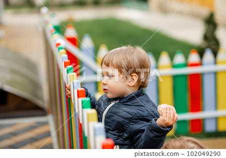 Happy and healthy childhood. Colorful modern playground. Happy and healthy childhood. Colorful modern playground. 102049290