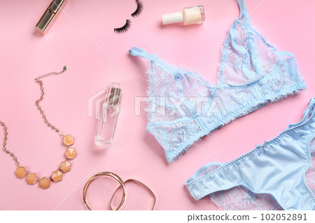 Flat lay composition with sexy women's underwear on pink background Flat lay composition with sexy women's underwear on pink background 102052891