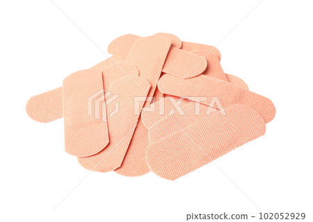 Medical sticking plasters isolated on white. First aid item Medical sticking plasters isolated on white. First aid item 102052929