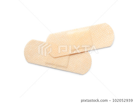 Medical sticking plasters isolated on white. First aid item Medical sticking plasters isolated on white. First aid item 102052939