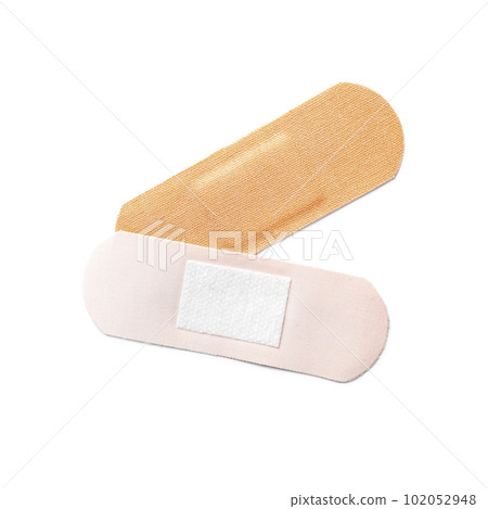 Medical sticking plasters isolated on white. First aid item Medical sticking plasters isolated on white. First aid item 102052948