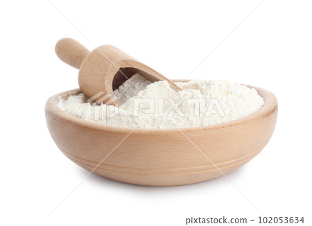 Organic flour and scoop in wooden bowl isolated on white 102053634