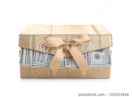 Gift box with dollar bills isolated on white Gift box with dollar bills isolated on white 102053886