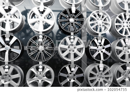 Alloy wheels on display in auto store Alloy wheels on display in auto store 102054735