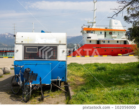 Port area. Ship on the coast. Technics. Sea coast. Port area. Ship on the coast. Technics. Sea coast. 102056000
