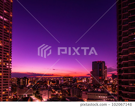 Images of sky, clouds, city and buildings, night view from sunset 102067148