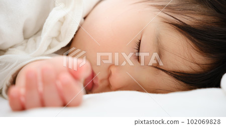 Baby's sleeping face 102069828