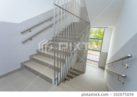 Staircase with stainless steel bar protection installed. Staircase with stainless steel bar protection installed. 102075856