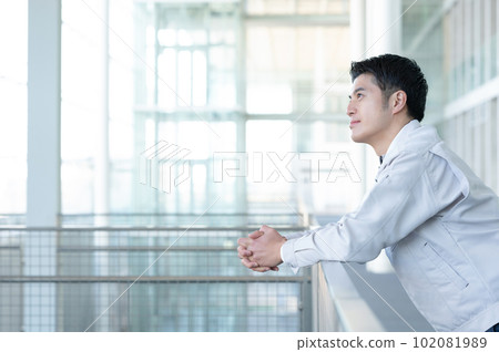 Men in work clothes middle age thinking Men in work clothes middle age thinking 102081989