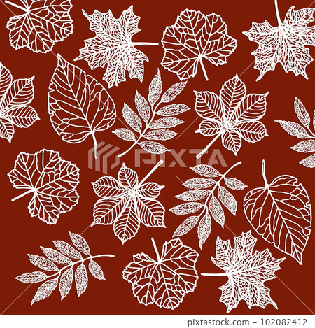 The carve of white paper leaves with empty space on a red colour cardboard background. 102082412