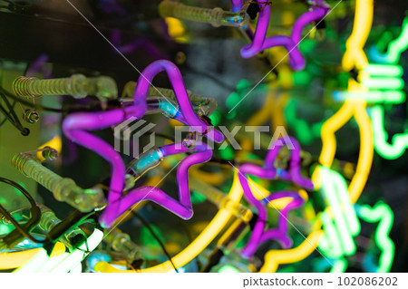 A star-shaped light made of neon A star-shaped light made of neon 102086202
