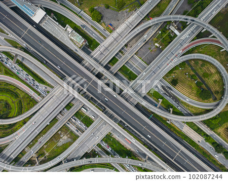 Aerial view city junction road with vehicle movement 102087244