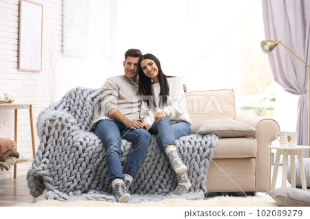 Happy couple spending time together at home. Winter vacation 102089279